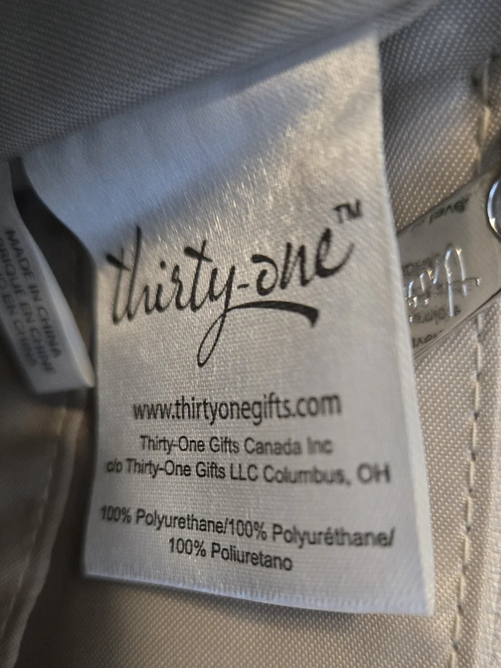 Thirty-One Black Crossbody Bag with Assorted Coral and Patterned Pouches